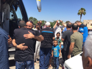 بالصور: عودة معتمري اللد والرملة إلى ديارهم سالمين 